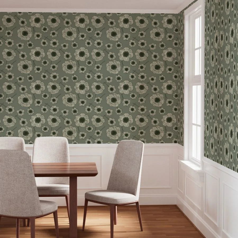 Dining room with green floral wallpaper, Blooming Field by Indigo Pruitt, featuring large cream and sage blossoms against a muted green background.