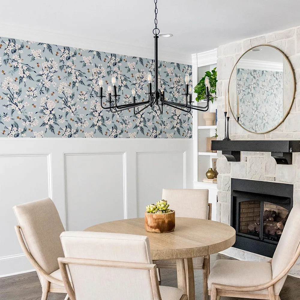 Flowers and honey bees wallpaper in a dining area.
