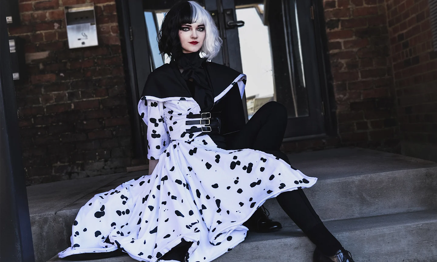 Girl in Cruella Deville inspired costume.