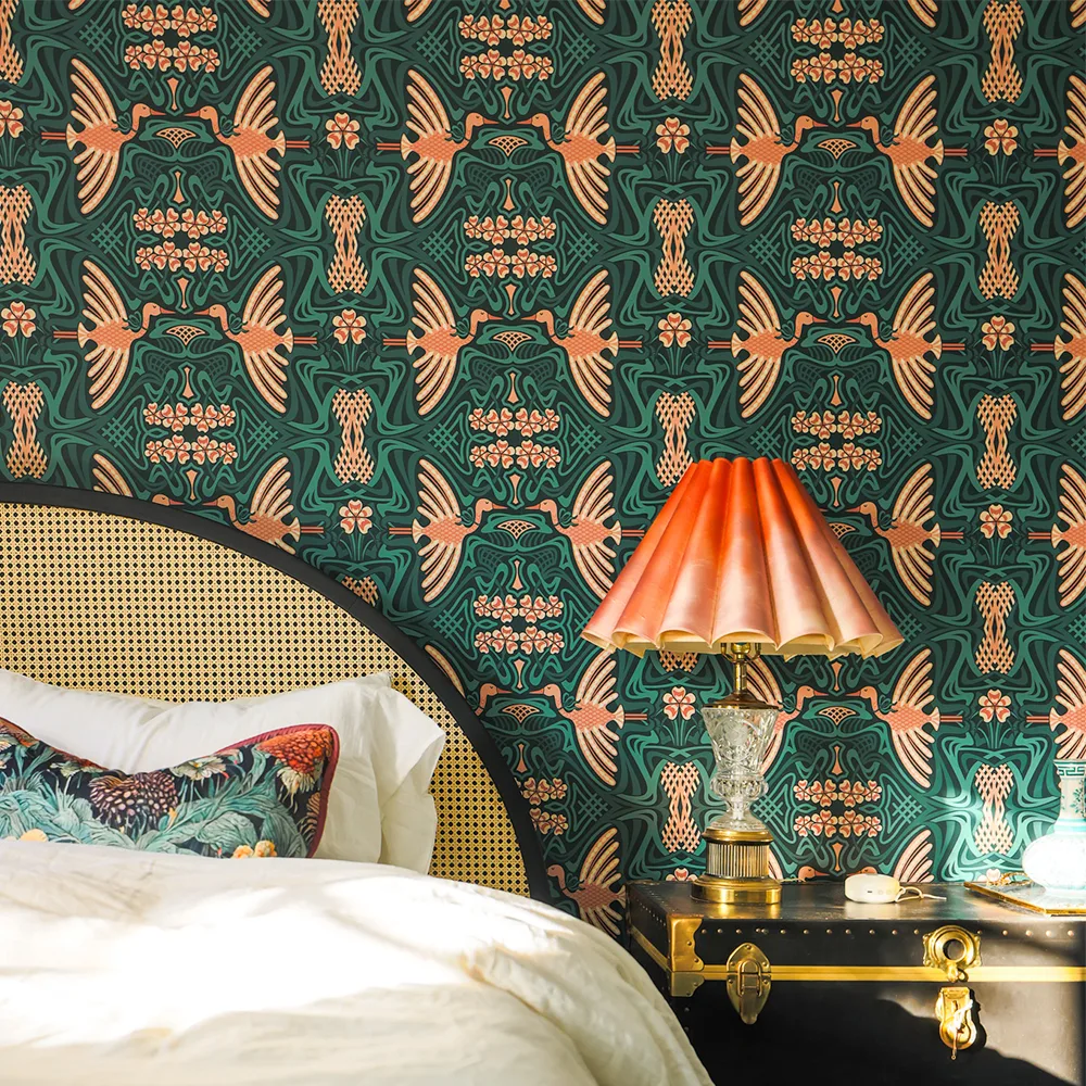 Bedroom with art deco crane wallpaper.