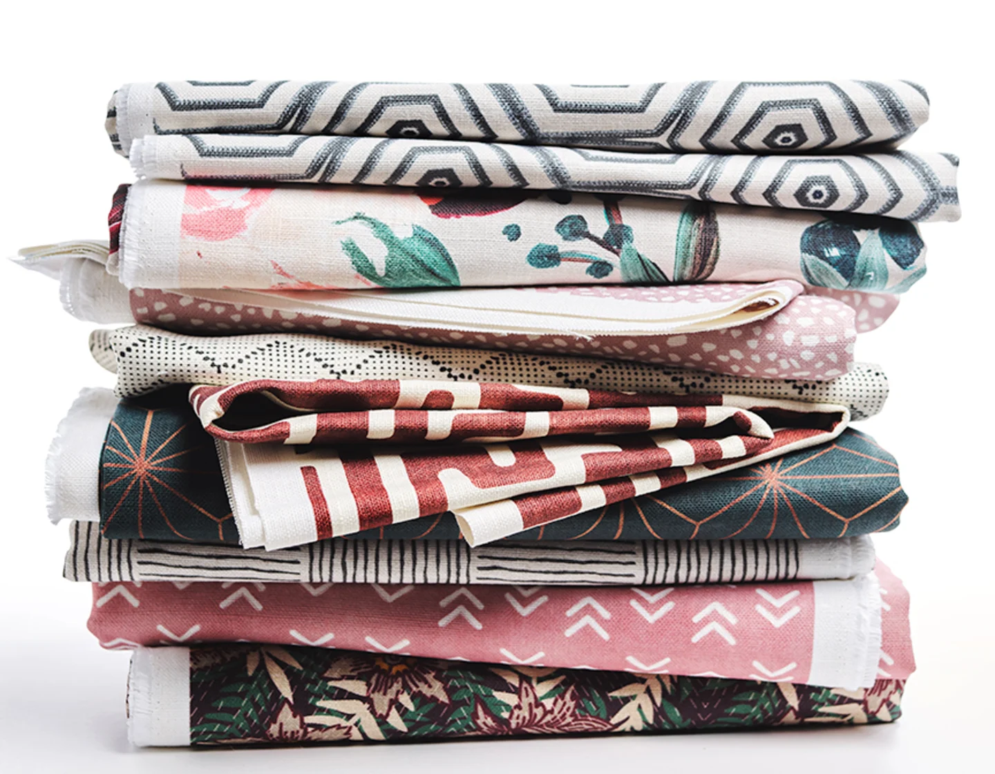 Stack of printed linen fabrics