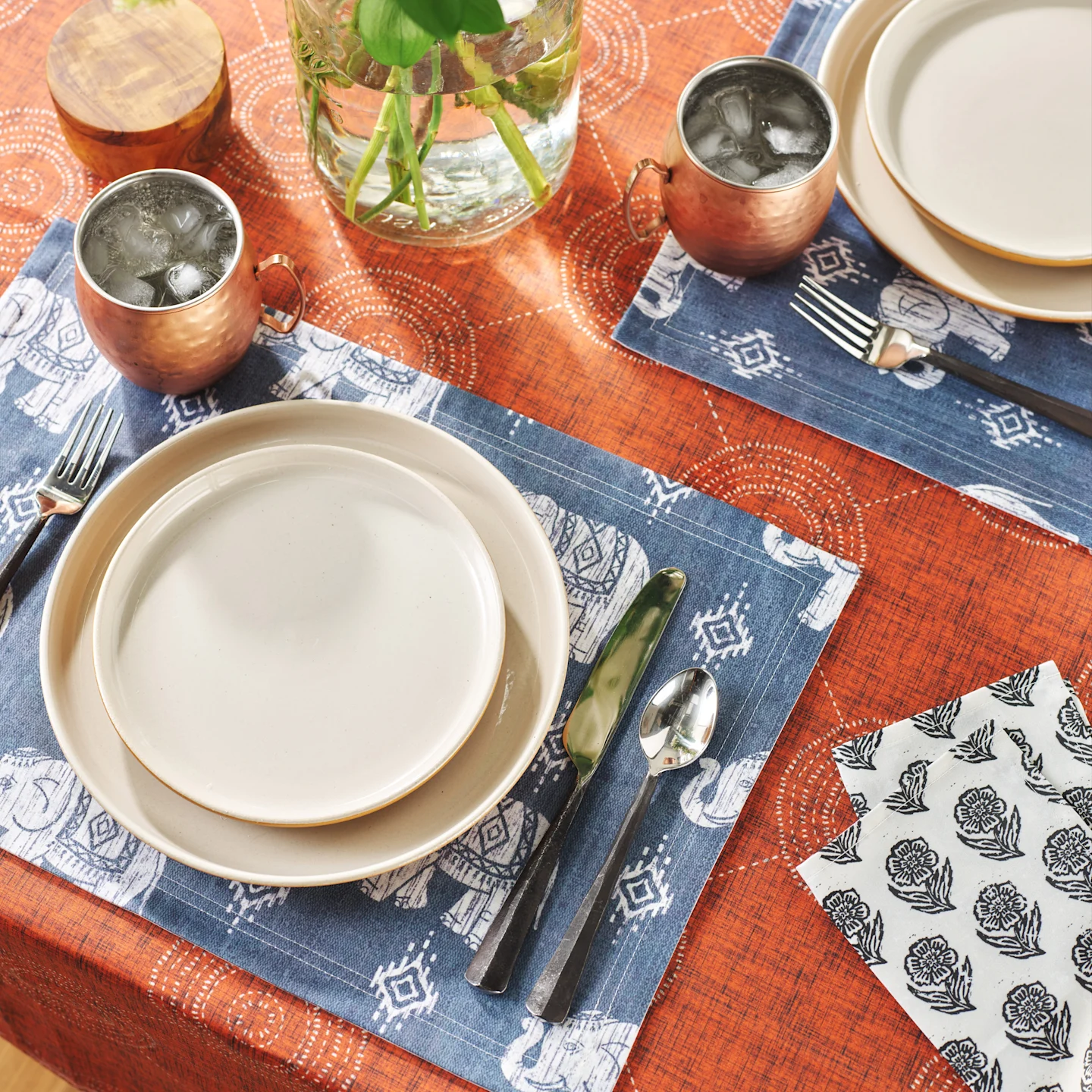 Placemats set on dining table with plates
