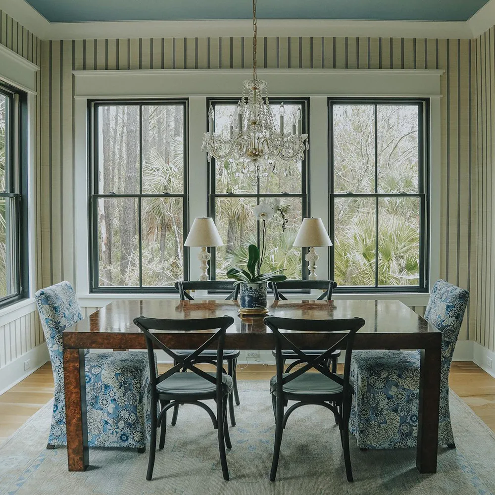 Dining room with striped wallpaper by Spoonflower artist Holli Zollinger.
