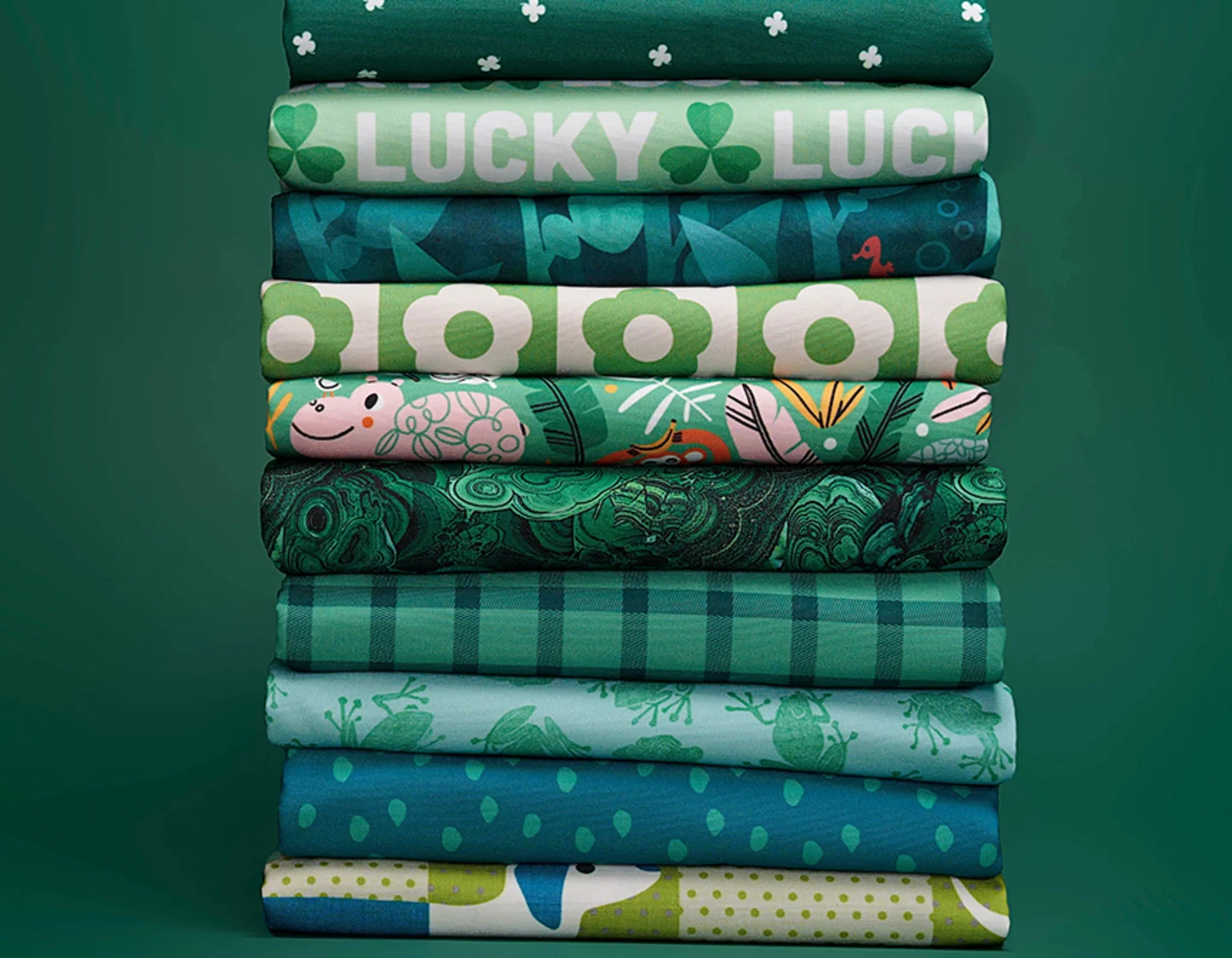 stack of 4 greeen-toned fabrics and text overlay reads "Tracable Waste Diversion" and icon overlay reads "Made Recycled Repreve"