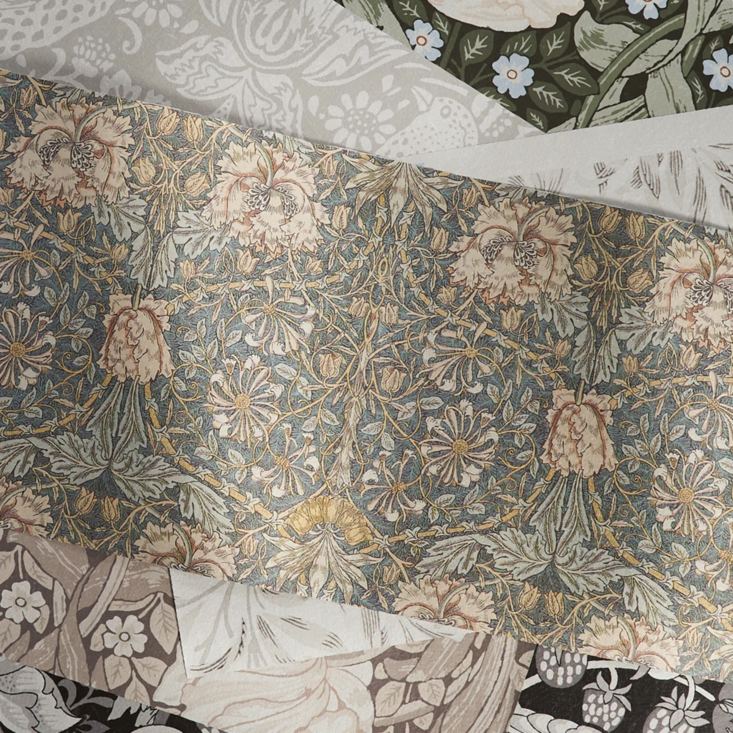 Heritage designs on silver wallpaper