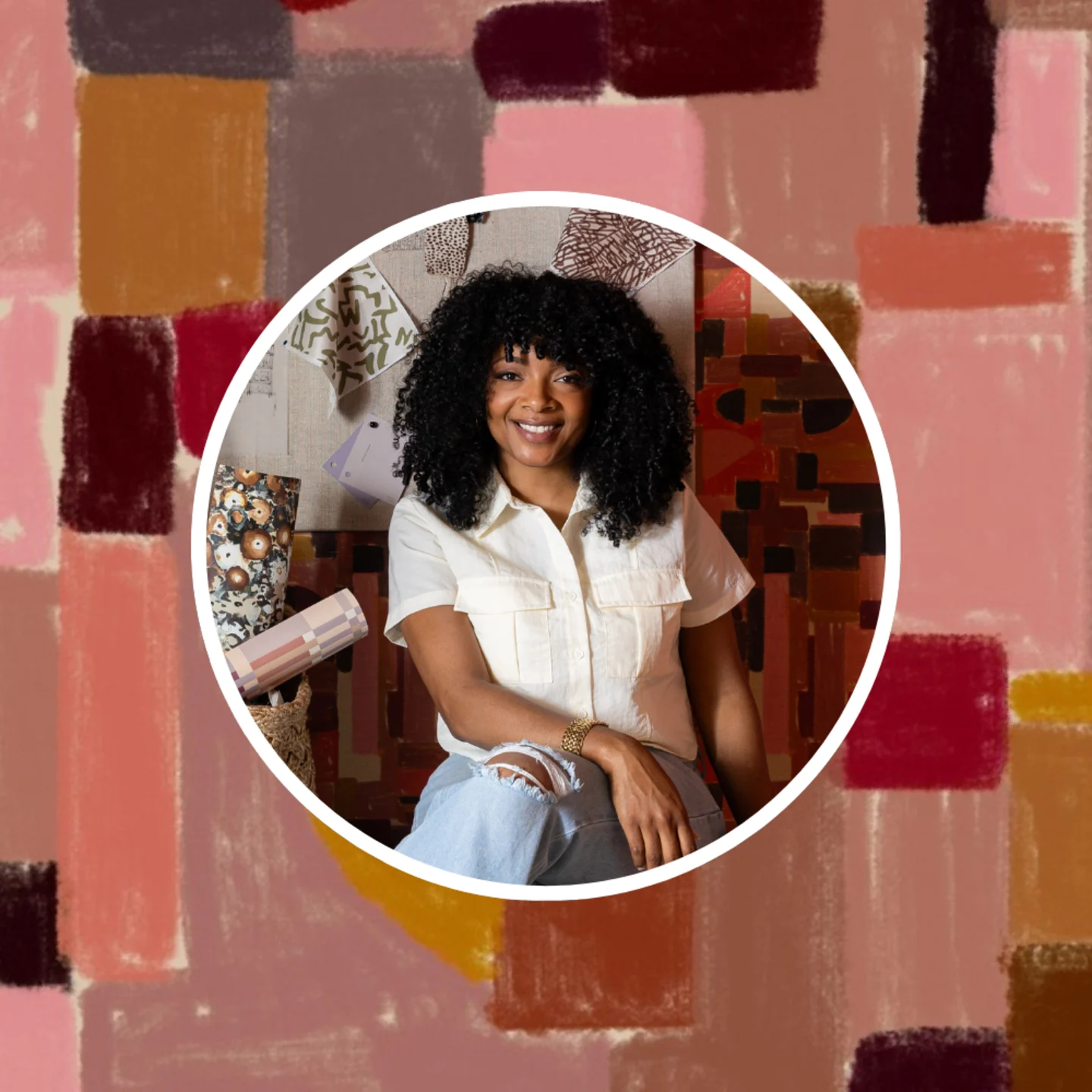 Headshot of Marie of Indigo Pruitt in front of one of her designs.