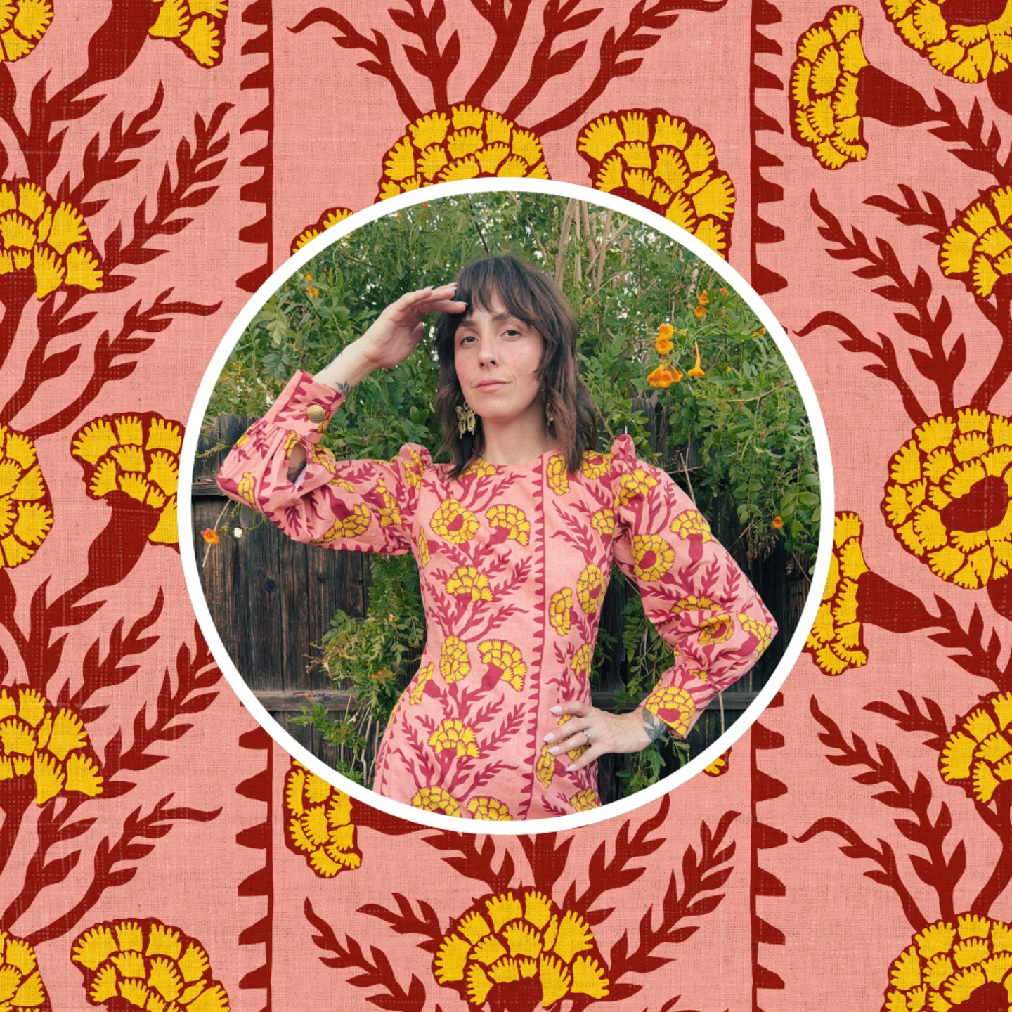 Kelsey Garner in one of her handmade dresses in front of a bright pink and yellow boho Holli Zollinger design