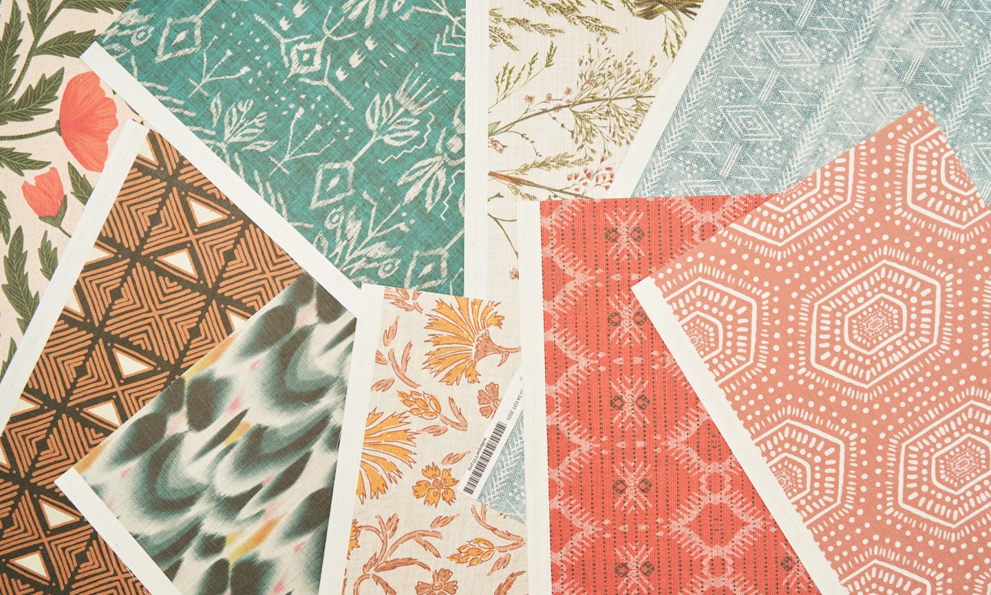 Assorted designs on grasscloth wallpaper